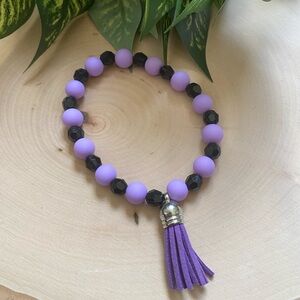 Purple & Black Silicone/Crystal Beaded Bracelet With Tassel Charm Size 8 Inches